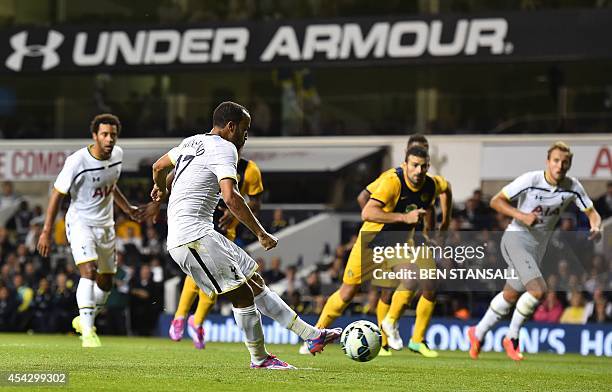 Tottenham Hotspur's English midfielder Andros Townsend scores from the penalty spot for their third goal during the UEFA Europa League qualifying...