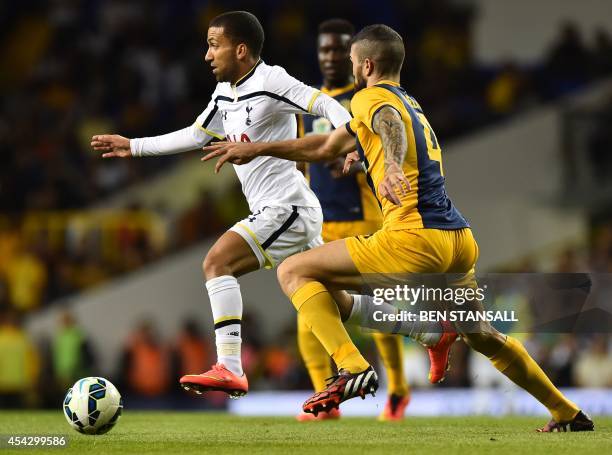 Tottenham Hotspur's English midfielder Aaron Lennon takes on AEL Limassol's Cypriot defender Valentinos Sielis during the UEFA Europa League...