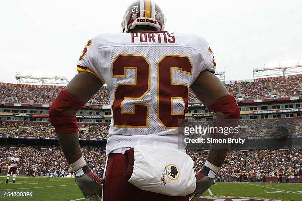 Washington Redskins Clinton Portis with memorial helmet decal during tribute commemorating passing of Redskins safety Sean Taylor before game vs...