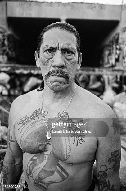 Actor Danny Trejo poses for a magazine editorial in 2006 in the LA River in 2006 in Los Angeles.