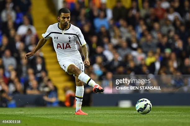 Tottenham Hotspur's English midfielder Aaron Lennon passes the ball during the UEFA Europa League qualifying round play-off second-leg football match...