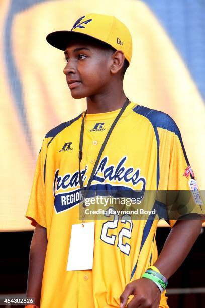 Jackie Robinson West little league baseball player Prentiss Luster acknowledges the crowd during the team's United States World Series Championship...