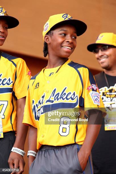 Jackie Robinson West little league baseball player Jaheim Benton acknowledges the crowd during the team's United States World Series Championship...