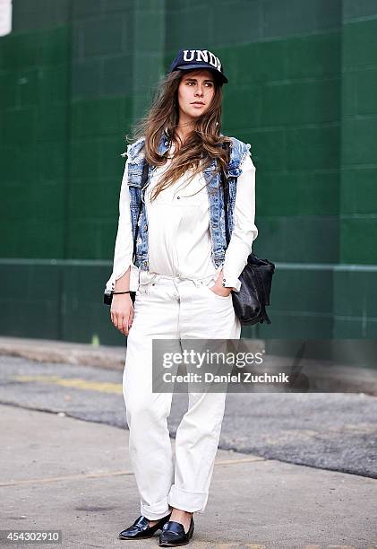 Designer Maren is seen around Soho wearing Levis jeans, Lee vest and a Cos bag on August 28, 2014 in New York City.