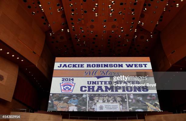 Jackie Robinson West's little league Championship Banner hangs above the stage during the team's United States World Series Championship Rally at...