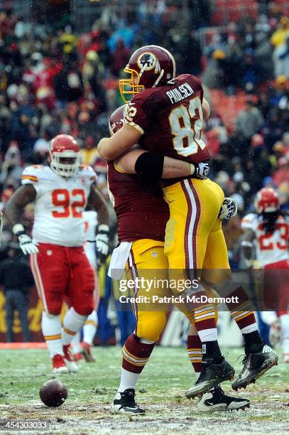 Logan Paulsen of the Washington Redskins celebrates after scoring a touchdown in the second quarter during an NFL game against the Kansas City Chiefs...