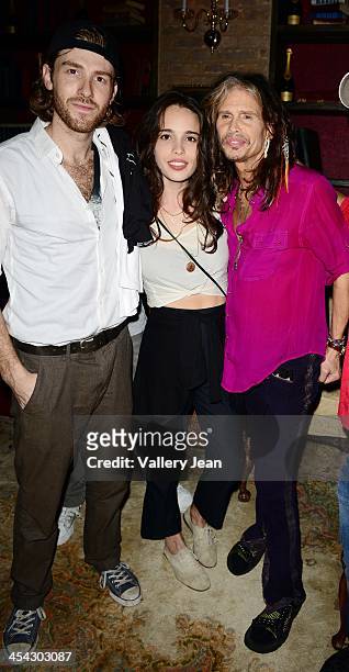 Jon Foster, Chelsea Tyler of BadBad and her father Steven Tyler pose for picture after performing on December 7, 2013 in Fort Lauderdale, Florida.