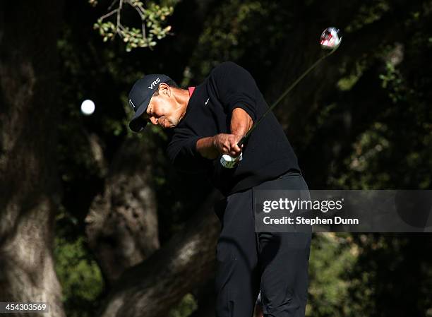 Tiger Woods hits his tee shot on the sixth hole during the final round of the Northwestern Mutual World Challenge at Sherwood Country Club on...