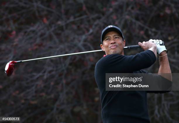 Tiger Woods hits his tee shot on the second hole during the final round of the Northwestern Mutual World Challenge at Sherwood Country Club on...