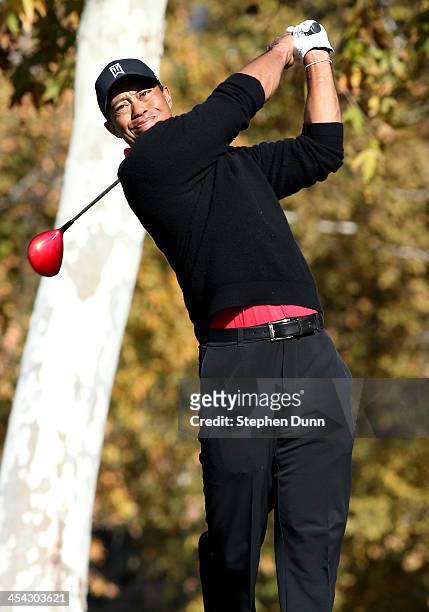 Tiger Woods hits his tee shot on the fifth hole during the final round of the Northwestern Mutual World Challenge at Sherwood Country Club on...