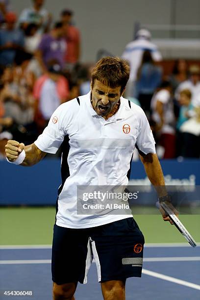 Tommy Robredo of Spain reacts after a point against Simone Bolelli of Italy during their men's singles second round match on Day Four of the 2014 US...