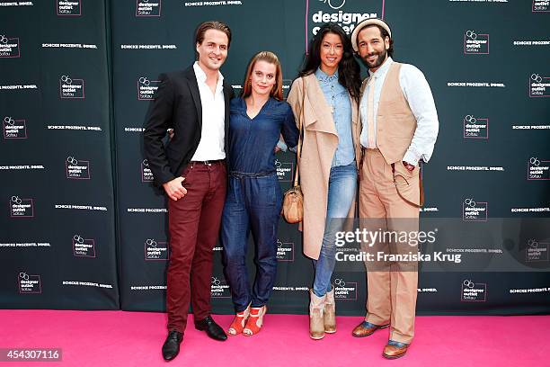 Nadja Scheiwiller; Alexander Klaws, Rebecca Mir and Massimo Sinato attend the Late Night Shopping Designer Outlet Soltau on August 28, 2014 in...