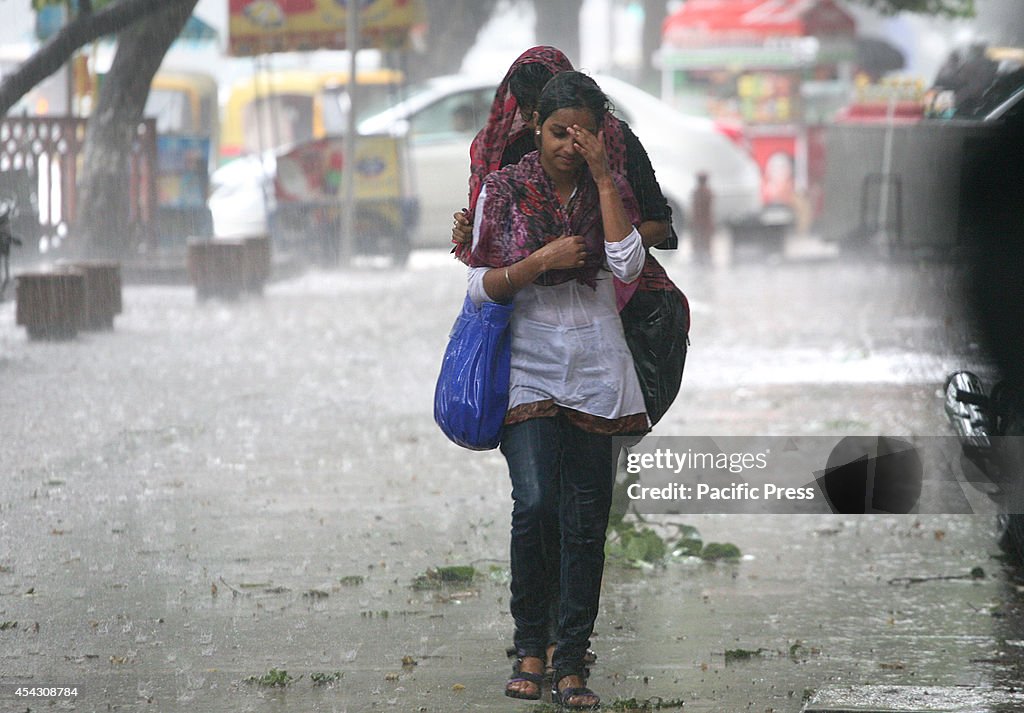 Girls Enjoying the rain  as local residents  were relieved...