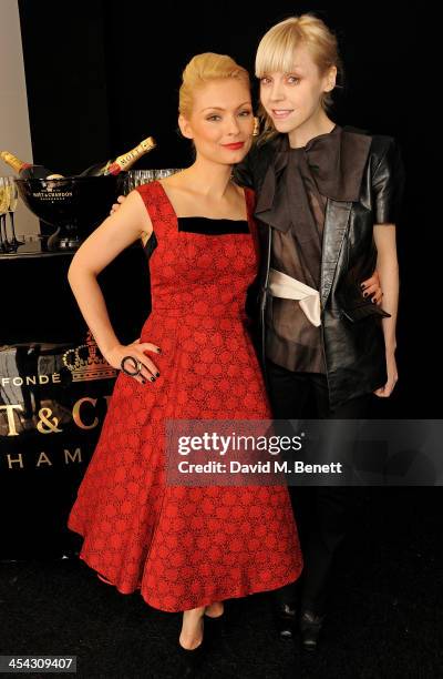 Presenters MyAnna Buring and Antonia Campbell-Hughes pose backstage at the Moet British Independent Film Awards 2013 at Old Billingsgate Market on...