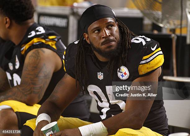 Jarvis Jones of the Pittsburgh Steelers looks on from the sidelines during a game against the Carolina Panthers at Heinz Field on August 28, 2014 in...