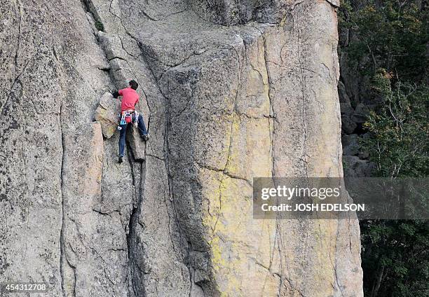 By Ammu Kannampilly, Lifestyle-sport-extreme-Nepal-mountaineering-Everest British guide Adrian Ballinger scales a rock face in the Donner Summit area...