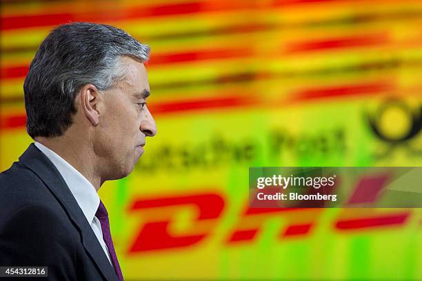 Frank Appel, chief executive officer of Deutsche Post AG, listens during a Bloomberg Television interview in Hong Kong, China, on Friday, Aug. 29,...
