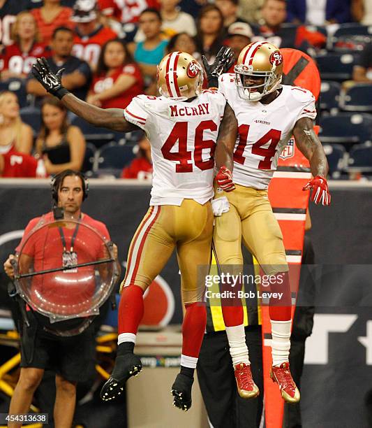 James McCray of the San Francisco 49ers celebrates with Kassim Osgood after special teams blocked a Houston Texans punt for a safety at Reliant...
