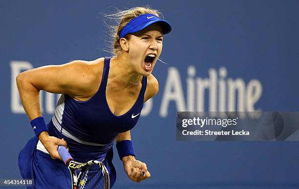 Eugenie Bouchard of Canada celebrates match point against Sorana Cirstea of Romania on Day Four of the 2014 US Open at the USTA Billie Jean King...