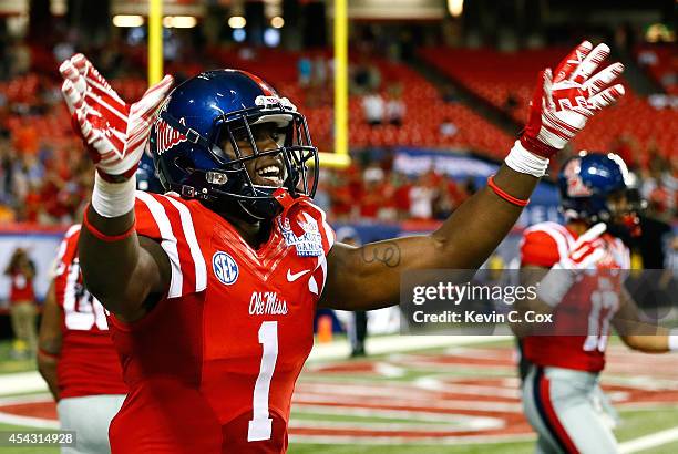 Laquon Treadwell of the Mississippi Rebels reacts after scoring a touchdown against the Boise State Broncos at Georgia Dome on August 28, 2014 in...