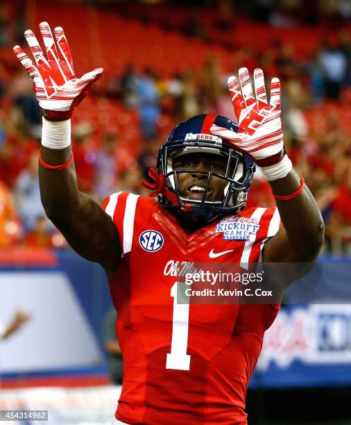 Laquon Treadwell of the Mississippi Rebels reacts after scoring a touchdown against the Boise State Broncos at Georgia Dome on August 28, 2014 in...