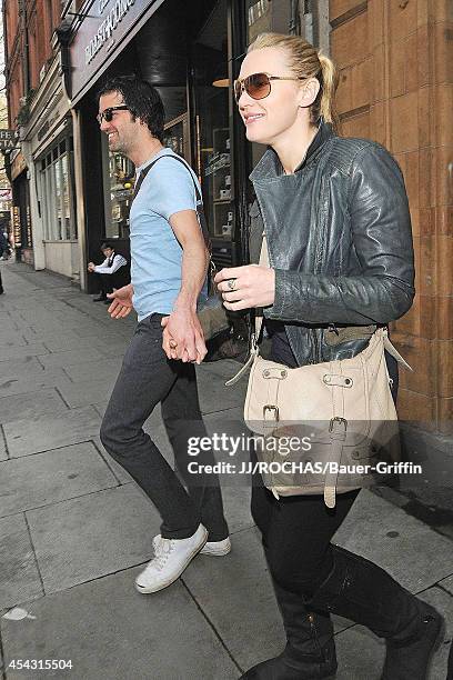 Kate Winslet with her boyfriend Ned Rocknroll are seen on March 24, 2012 in London, United Kingdom.