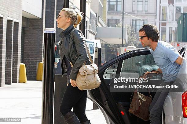 Kate Winslet with her boyfriend Ned Rocknroll are seen on March 24, 2012 in London, United Kingdom.