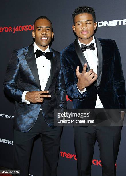 Mario and Trevor Jackson arrive at Trevor Jackson's Monster 18th birthday party held at El Rey Theatre on August 28, 2014 in Los Angeles, California.