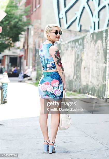 Madeline Dawson is seen around the Lower East Side wearing a Black Milk Clothing Company top and skirt, Zara shoes, Aldo purse, American Apparel...