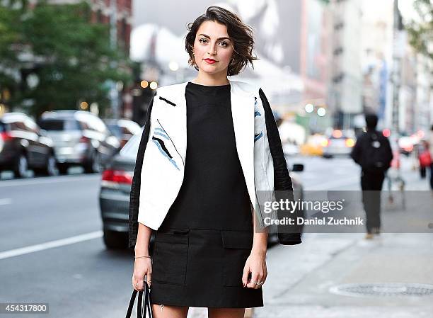 Charlotte is seen around Soho wearing a Tibi jacket and a Zara dress on August 28, 2014 in New York City.