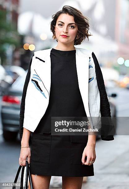 Charlotte is seen around Soho wearing a Tibi jacket and a Zara dress on August 28, 2014 in New York City.