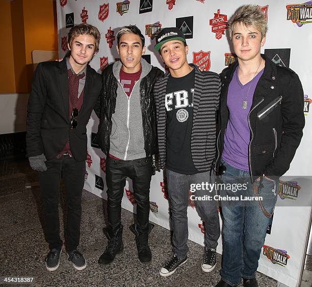 Singers Cole Pendery, Gabe Morales, Dana Vaughns and Dalton Rappatoni of IM5 arrive at The Salvation Army's 4th annual Rock The Red Kettle concert at...