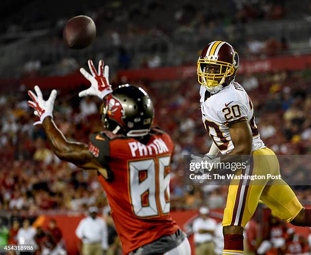 Washington Redskins cornerback Richard Crawford watches as Tampa Bay Buccaneers wide receiver Solomon Patton catches a pass before running it in for...