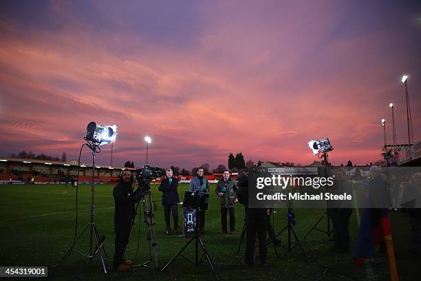 Presenter Adrian Chiles alongside Clarke Carlisle and Martin Allen during the FA Cup Second Round match between Tamworth and Bristol City at The Lamb...
