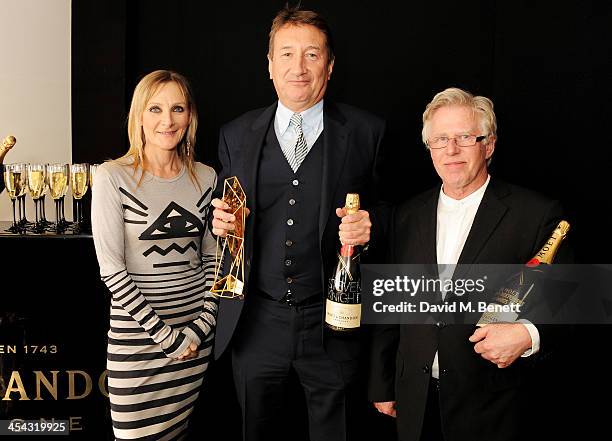 Steven Knight , winner of the Best Screenplay award for "Locke", poses with presenters Lesley Sharp and Phil Davis pose backstage at the Moet British...