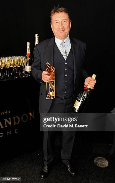 Steven Knight, winner of the Best Screenplay award for "Locke", poses backstage at the Moet British Independent Film Awards 2013 at Old Billingsgate...