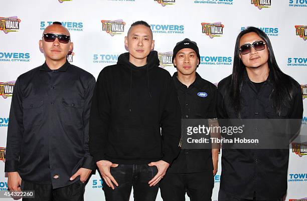Prohgress, Kev Nish, DJ Virman and J-Splif of Far East Movement pose for a photo during Universal CityWalk's Music Spotlight Concert Series at...