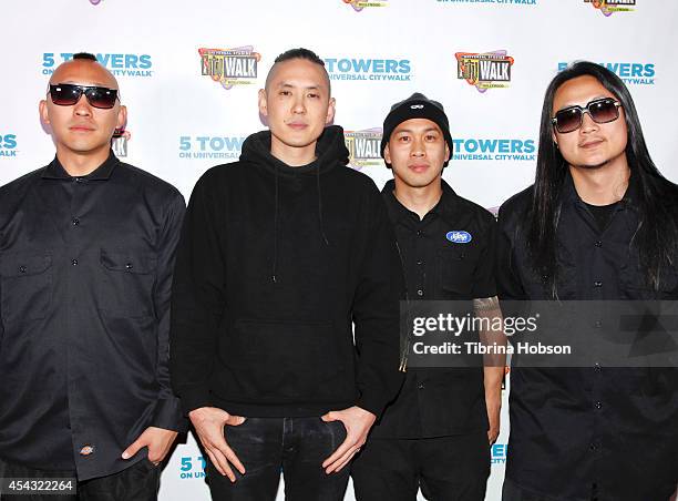 Prohgress, Kev Nish, DJ Virman and J-Splif of Far East Movement pose for a photo during Universal CityWalk's Music Spotlight Concert Series at...