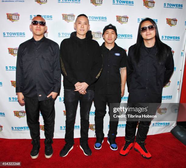 Prohgress, Kev Nish, DJ Virman and J-Splif of Far East Movement pose for a photo during Universal CityWalk's Music Spotlight Concert Series at...