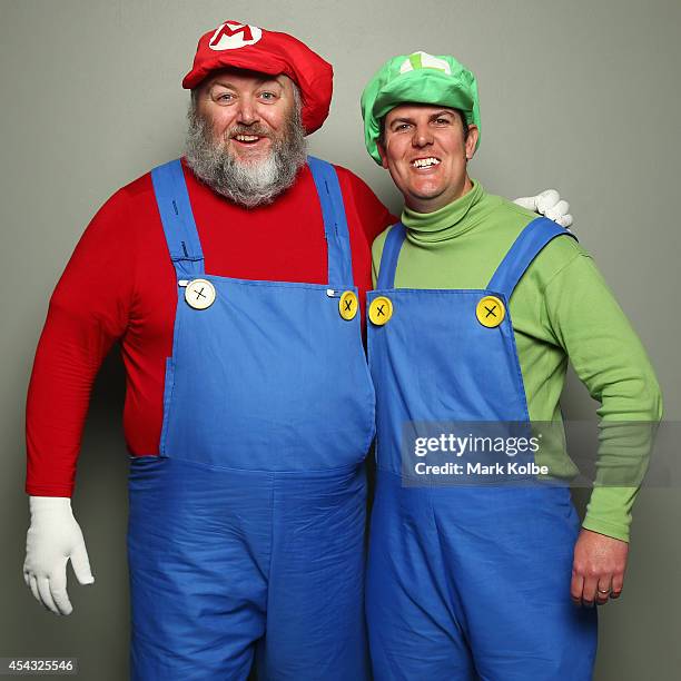 Darts fans in Mario Bros fancy dress pose as they arrive during the Sydney Darts Masters at Hordern Pavilion on August 29, 2014 in Sydney, Australia.