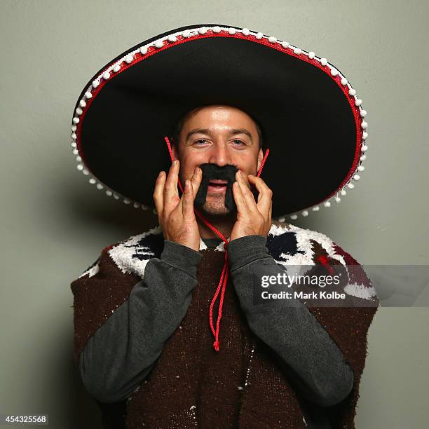 Darts fan in fancy dress poses as he arrives during the Sydney Darts Masters at Hordern Pavilion on August 29, 2014 in Sydney, Australia.