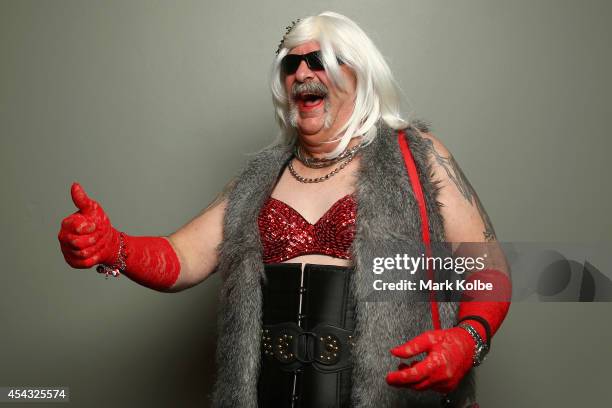 Darts fan in fancy dress poses as he arrives during the Sydney Darts Masters at Hordern Pavilion on August 29, 2014 in Sydney, Australia.