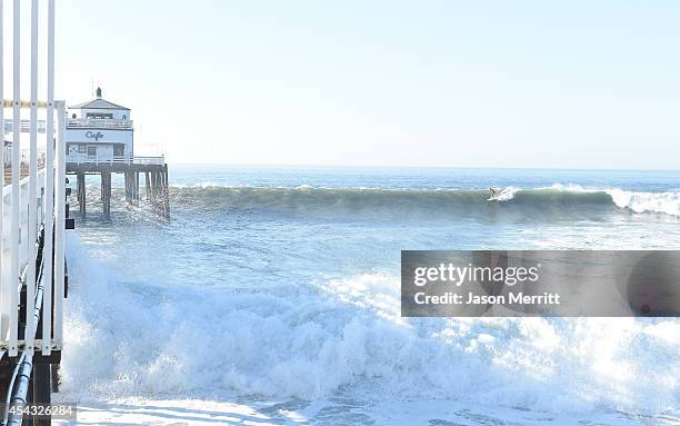 American big-wave surfer Laird Hamilton surfing during huge swells generated by hurricane Marie Reach on August 27, 2014 in Malibu, California.