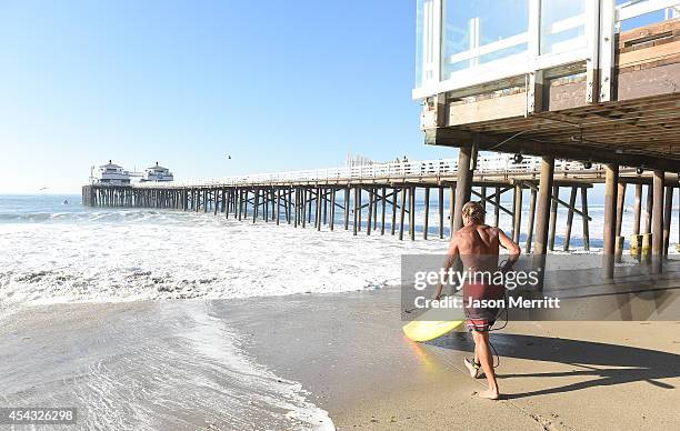 American big-wave surfer Laird Hamilton surfing during huge swells generated by hurricane Marie Reach on August 27, 2014 in Malibu, California.