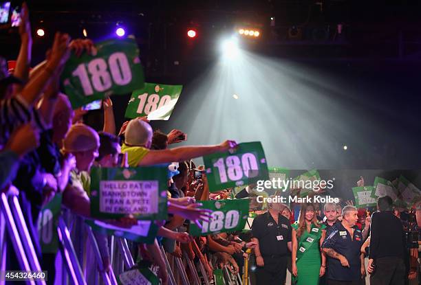 Phil Taylor of England walks to the stage during his quarter-final match against Dave Chisnall of England during the Sydney Darts Masters at Hordern...