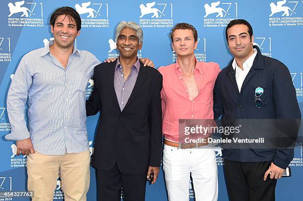 Producers Kevin Turen, Ashok Amritraj, Arcadiy Golubovich and Mohammed Al Turki attend the '99 Homes' photocall during the 71st Venice Film Festival...