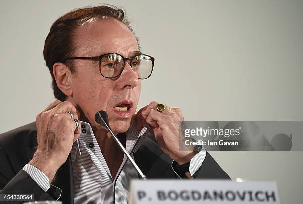 Director Peter Bogdanovich wearing a Jaeger-LeCoultre Master Hometime Aston Martin watch attends the 'She's Funny That Way' press conference before...