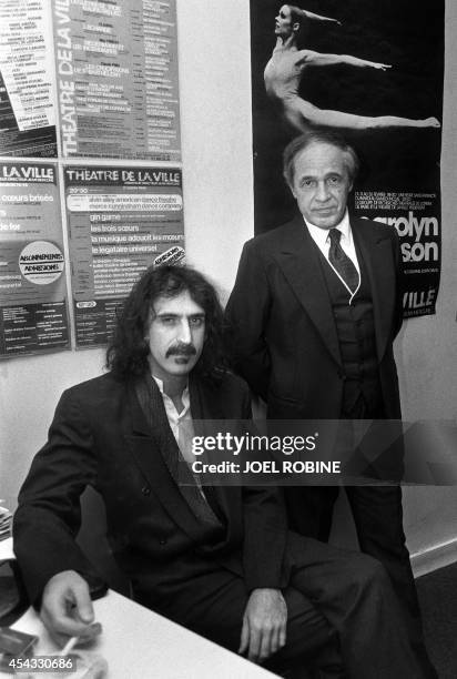 French conductor and composer Pierre Boulez poses with US composer and guitarist Frank Zappa, at the Theatre de la Ville in Paris, where he directed...