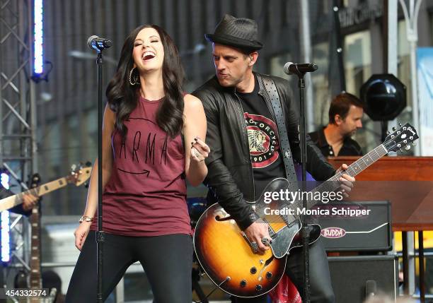 Shawna Thompson and Keifer Thompson of Thompson Square, perform during "FOX & Friends" All American Concert Series outside of FOX Studios on August...