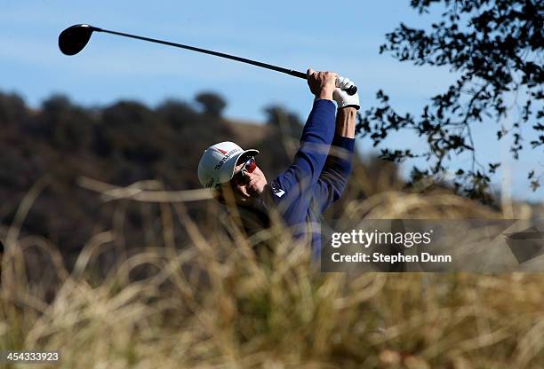 Zach Johnson hits his tee shot on the 11th hole during the final round of the Northwestern Mutual World Challenge at Sherwood Country Club on...